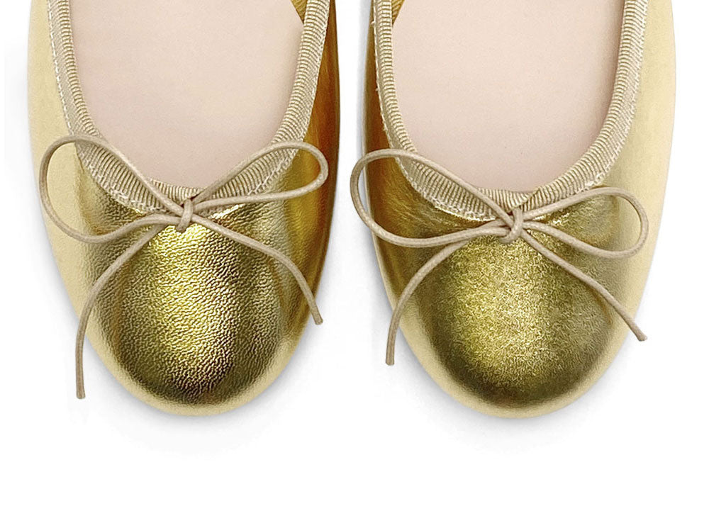 Ballerines dorées en cuir laminé