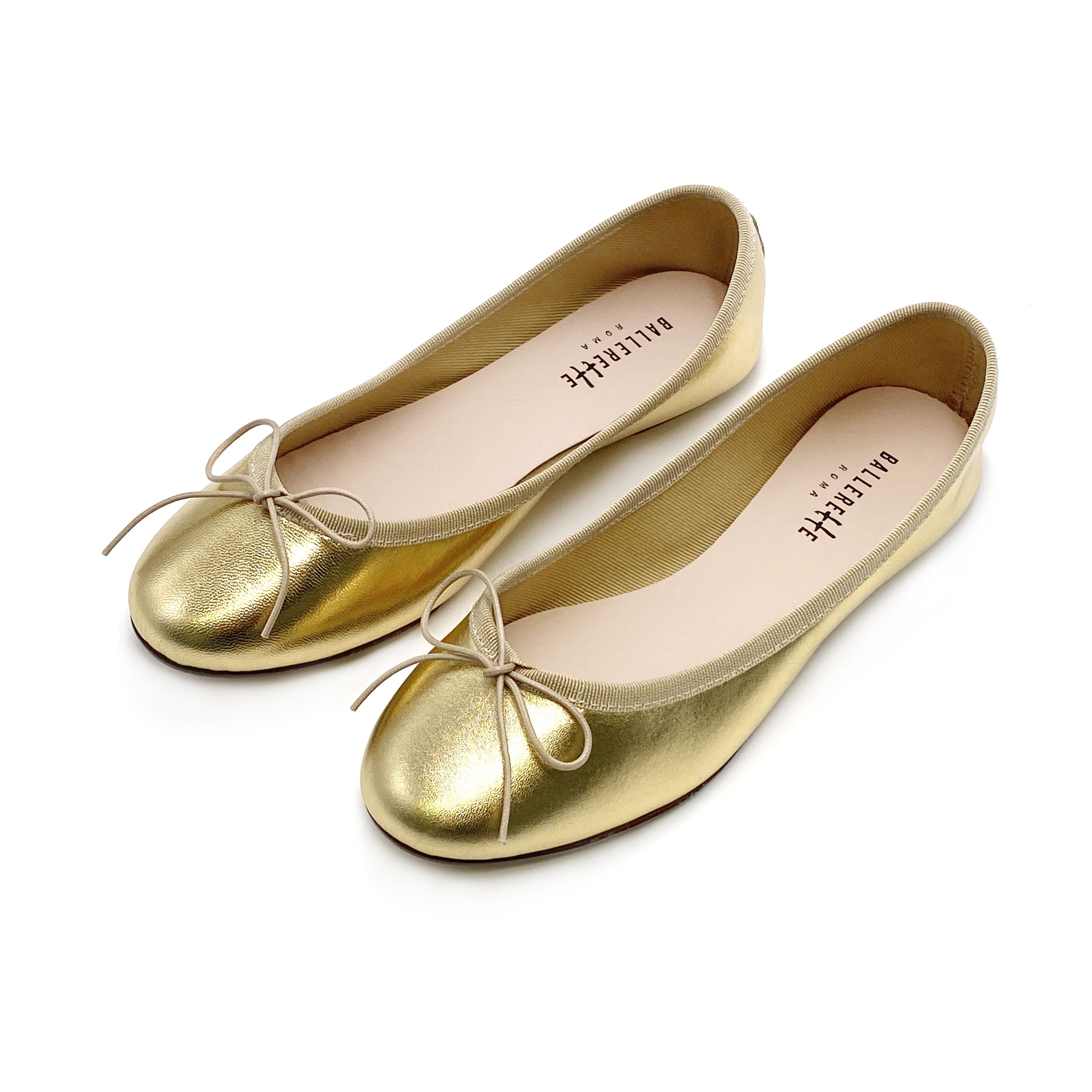 Ballerines dorées en cuir laminé