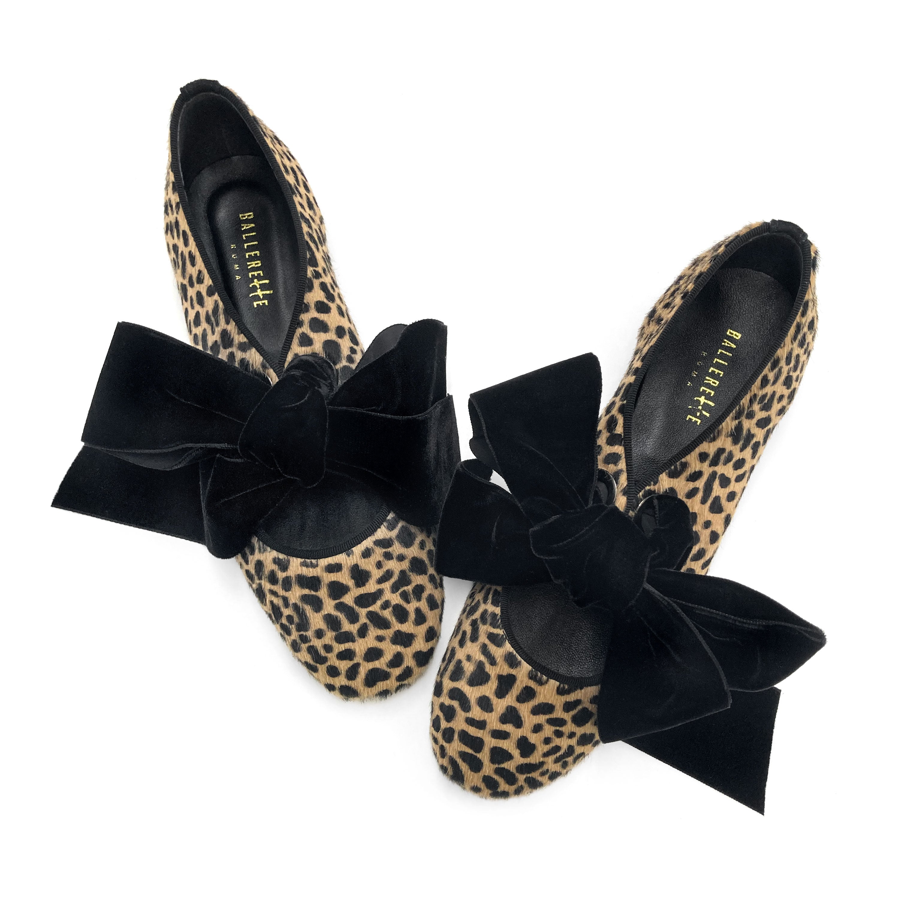 Damen Schuhe mit Animal-Print aus geflecktem Ponyfell