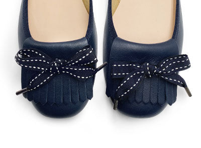 Mocassins en cuir bleu à talon et frange