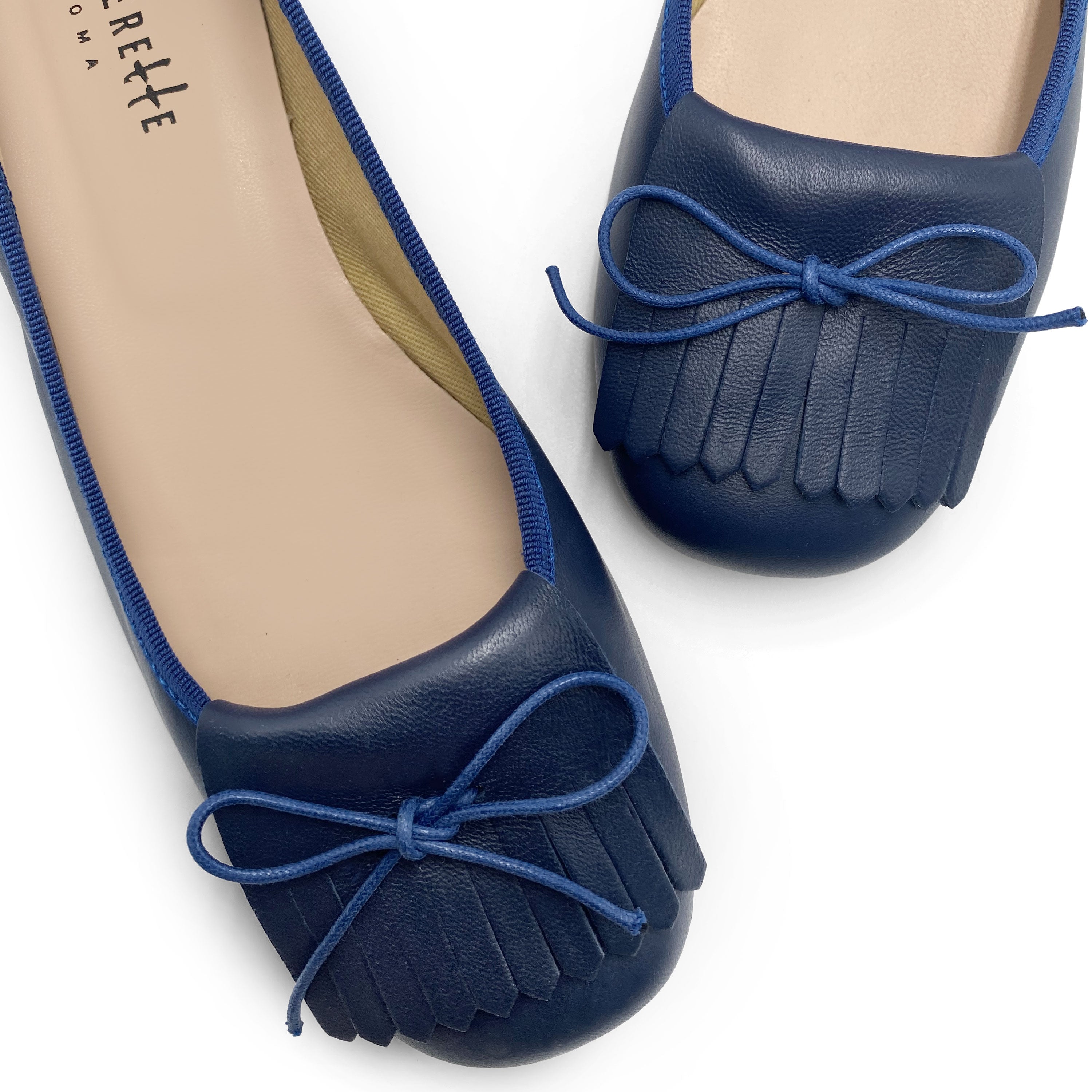 Mocassins en cuir bleu à talon et frange