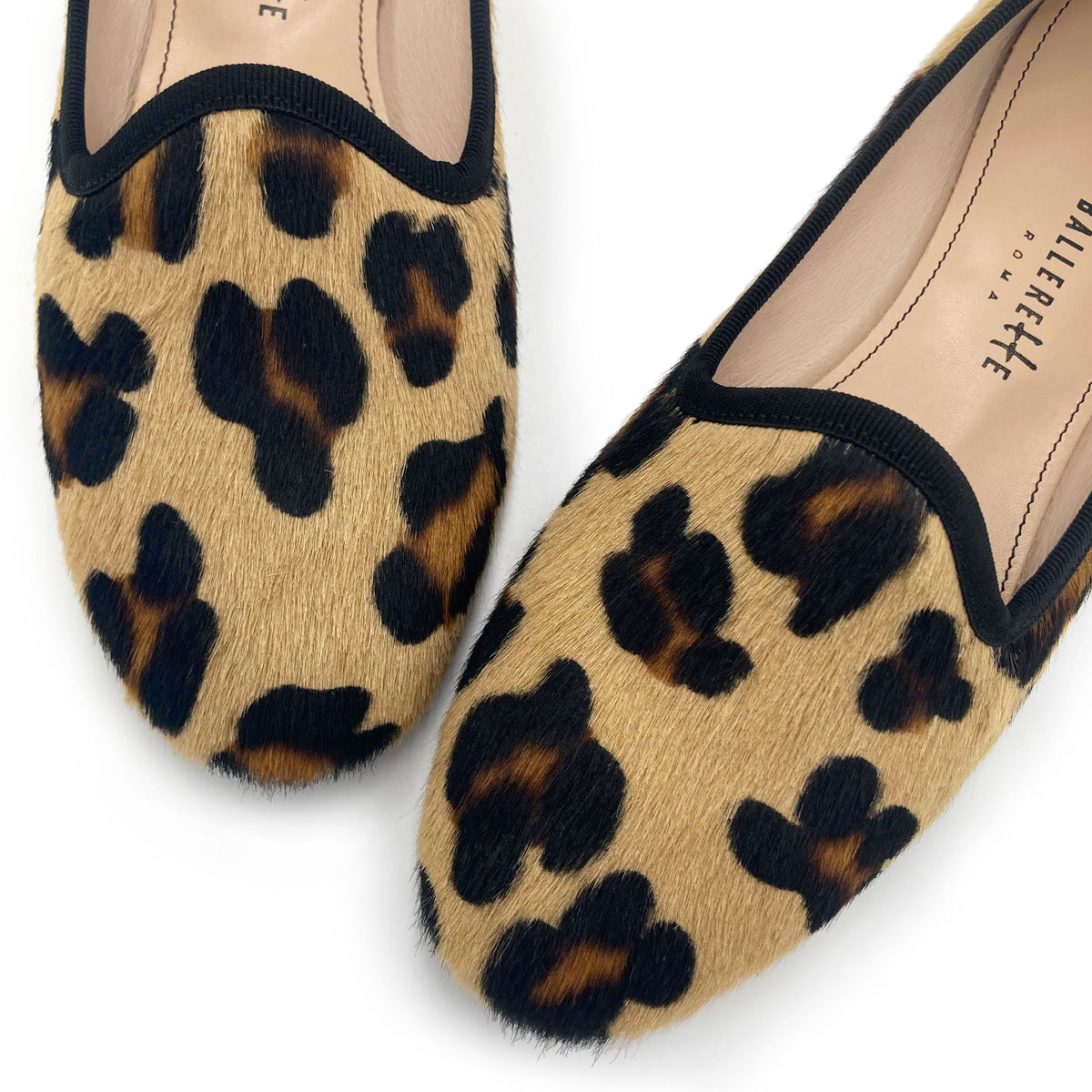 Slippers de mujer de piel con pelo estilo animal print