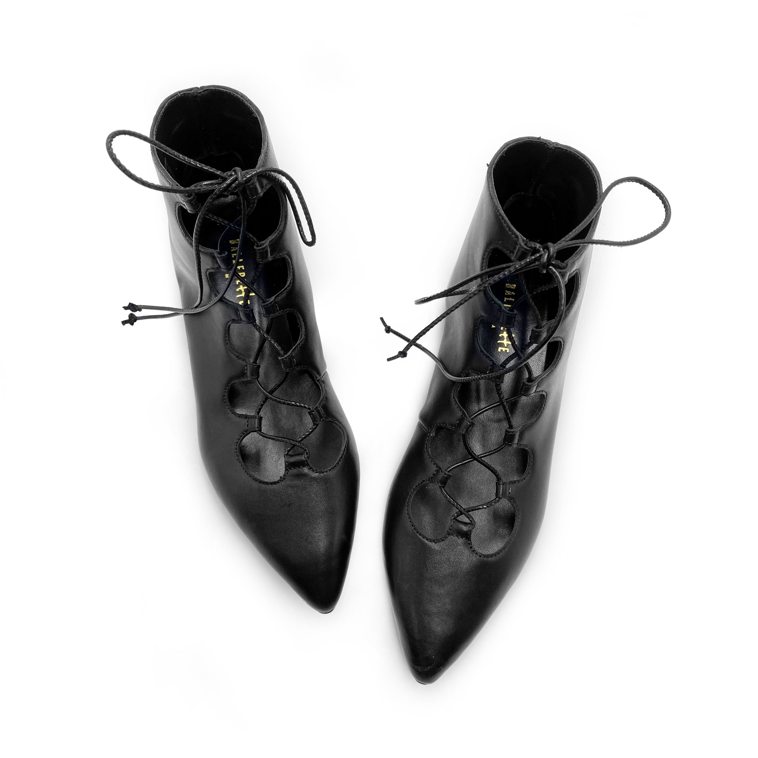 Black pointed ankle boots with laces