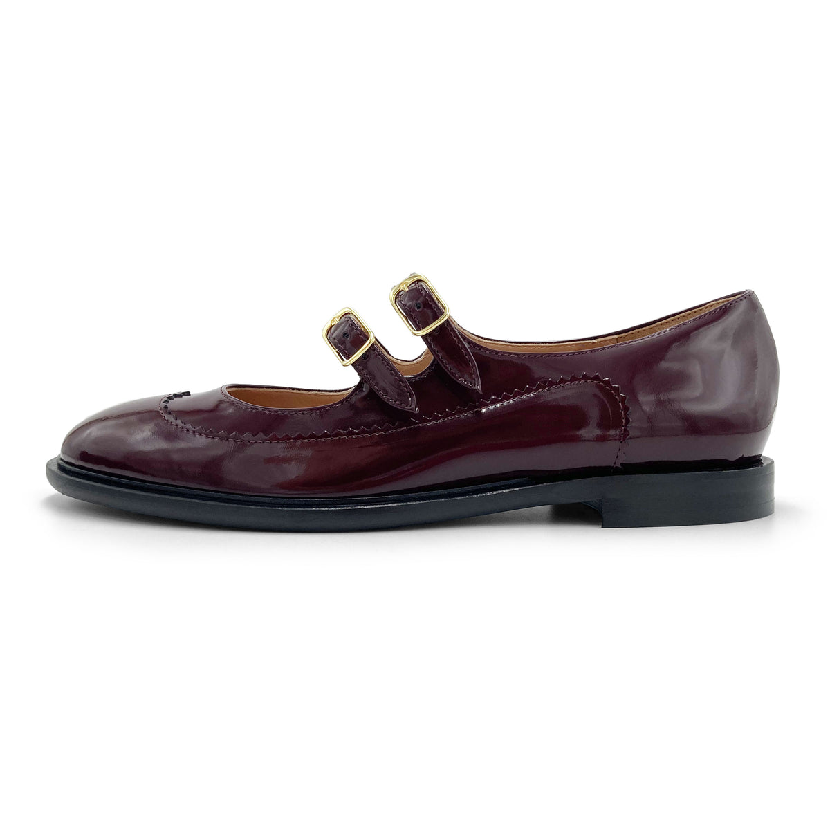 Wingtip-Brogue-Ballerinas aus bordeauxrotem Leder mit doppeltem Riemen