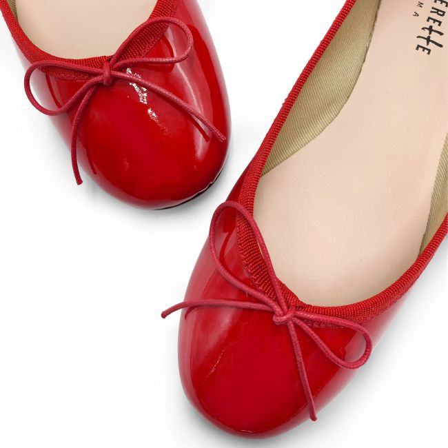 Red patent ballerinas
