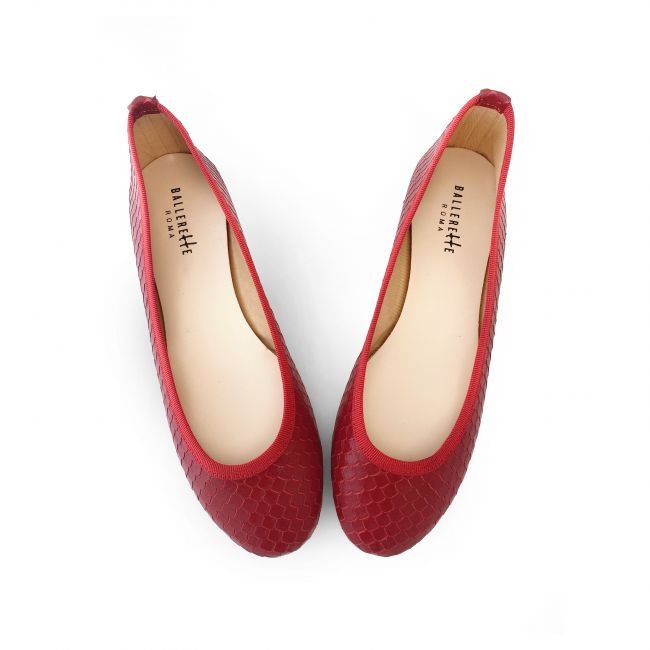Red carved leather ballet flats