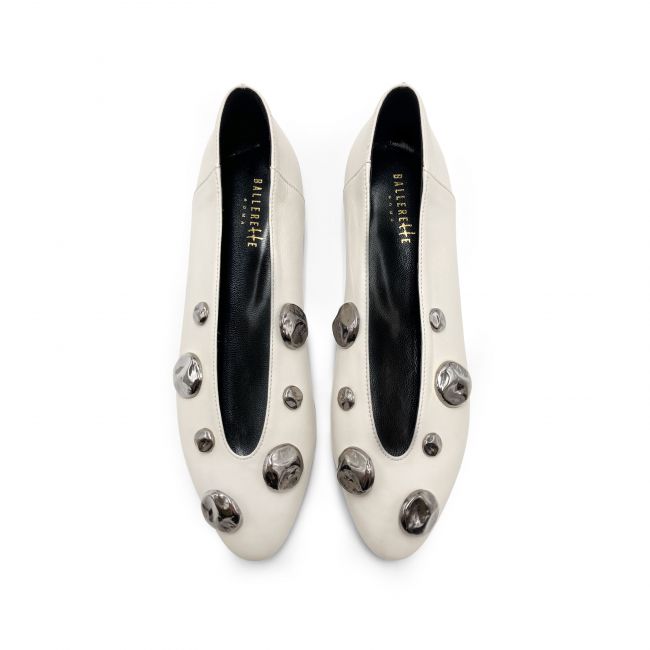 Ivory white leather high shoe-vamp flats with iron studs