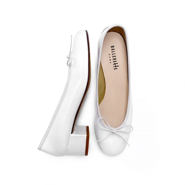 White patent ballerinas with high heels