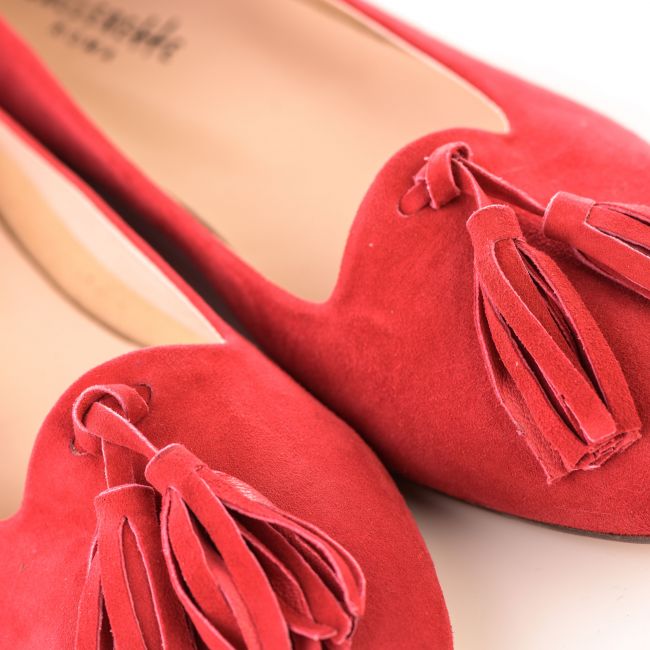 Red moccasins with tassels