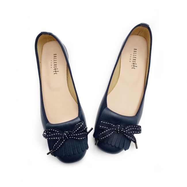 Blue leather moccasins with heel and fringe