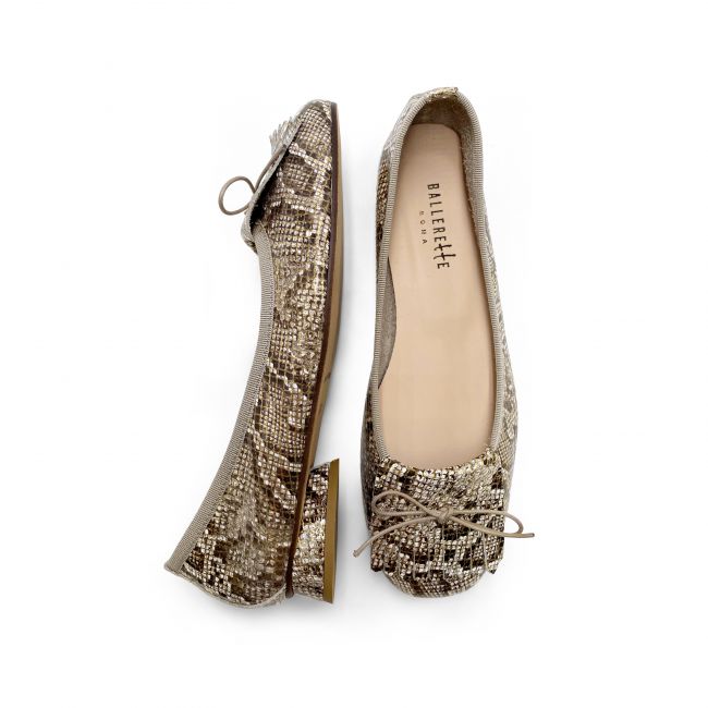 Women's moccasins with animal print leather heel