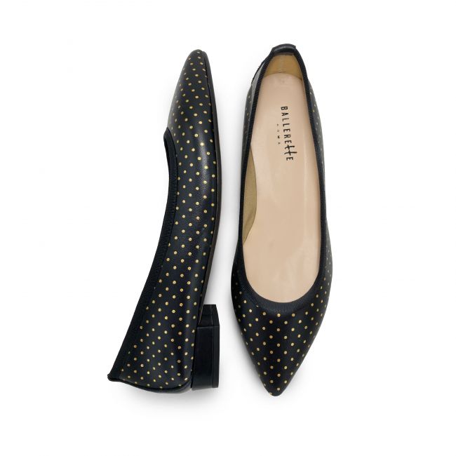 Pointed toe ballerinas in black leather with micro gold polka dots