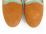 Tan suede women's loafers and green grosgrain