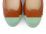 Tan leather ballet flats with green patent leather toe and stud